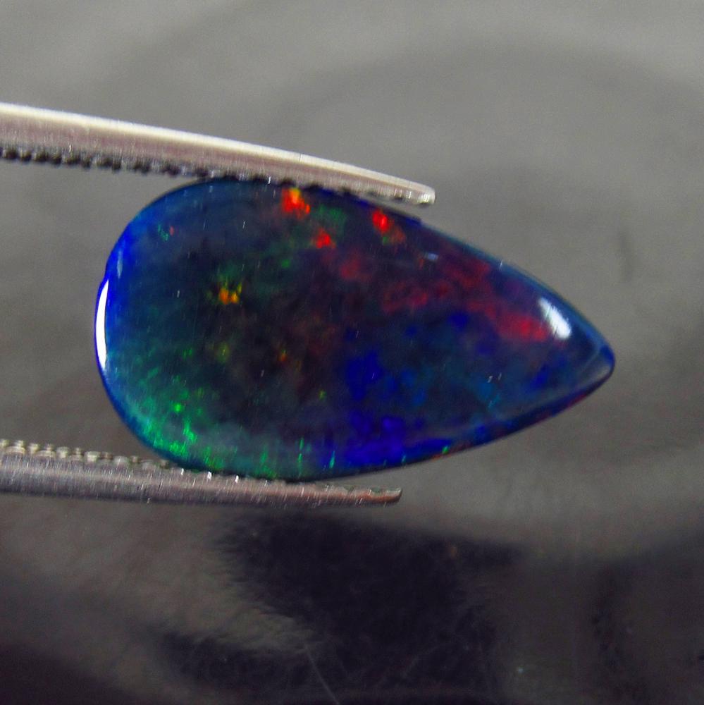 2.20 Ct Genuine Ethiopian Fire Black Opal Pear Cab (1 of 2)