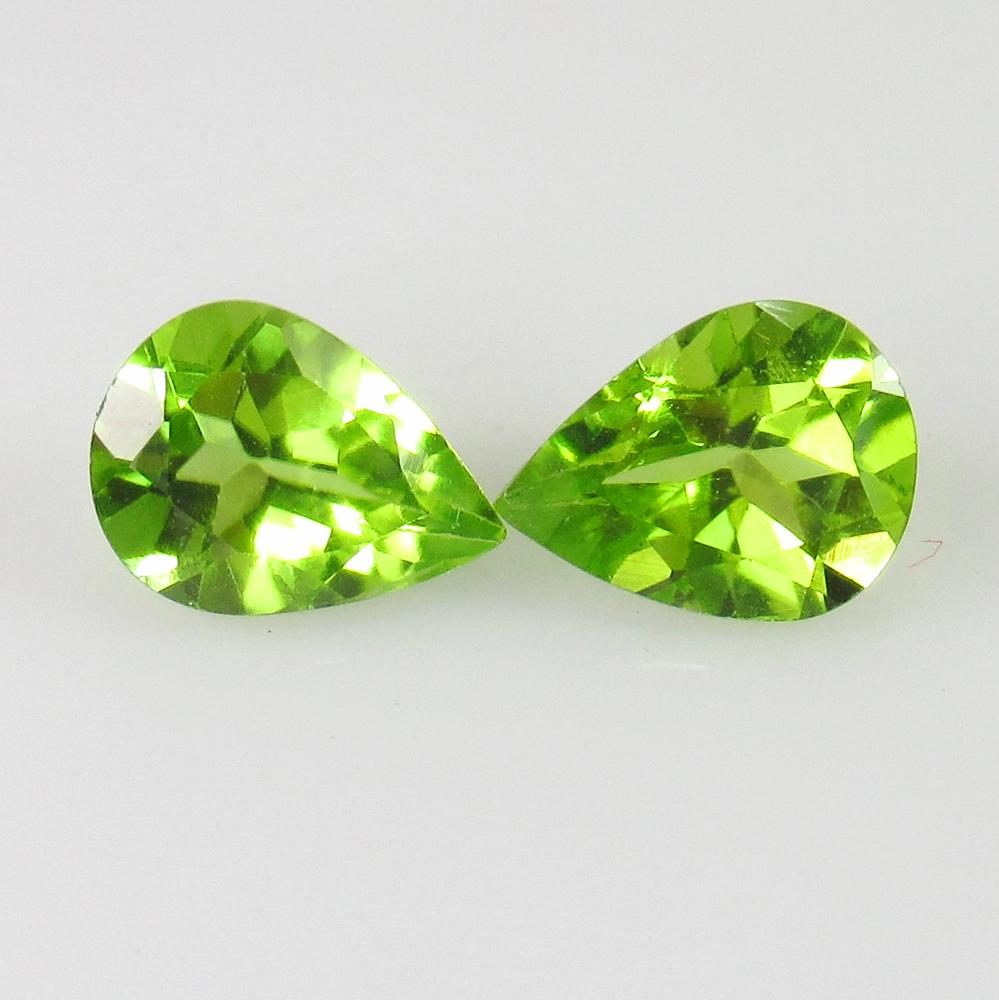 2.13 Ct Genuine Pakistan Peridot Pear Pair: No Reserve! Title: 2.13 Ct Genuine Pakistan Peridot Pear Pair Stone Clarity: VVS Gemstones: Natural Peridot Carat Weights: 2.13 Size/Dimensions: 8.00 x 5.90 x 3.90 mm / 2 PC's Additional Information: 