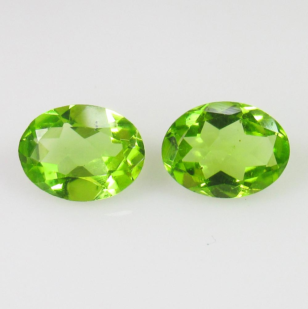 2.54 Ct Genuine Pakistan Peridot 8X6 mm Oval Pair: No Reserve! Title: 2.54 Ct Genuine Pakistan Peridot 8X6 mm Oval Pair Stone Clarity: VVS Gemstones: Natural Peridot Carat Weights: 2.54 Size/Dimensions: 8.20 x 6.10 x 3.60 mm / 2 PC's Additional Inform