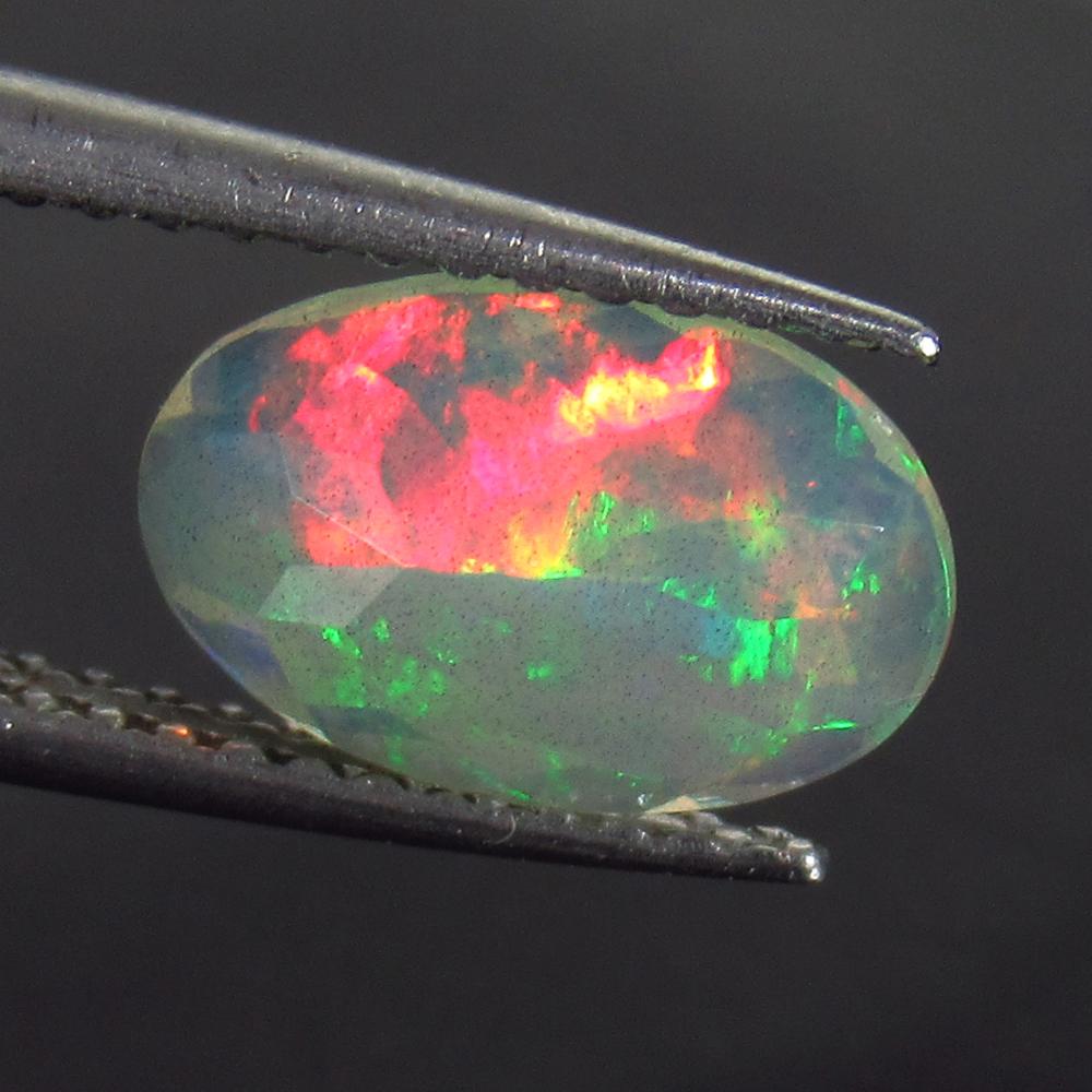 0.81 Ct Genuine Multi-Color Fire Faceted Opal Oval Cut (1 of 2)