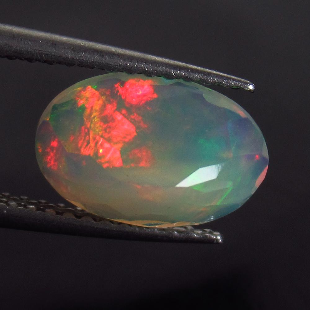 1.55 Ct Genuine Multi-Color Fire Faceted Opal Oval Cut (1 of 2)