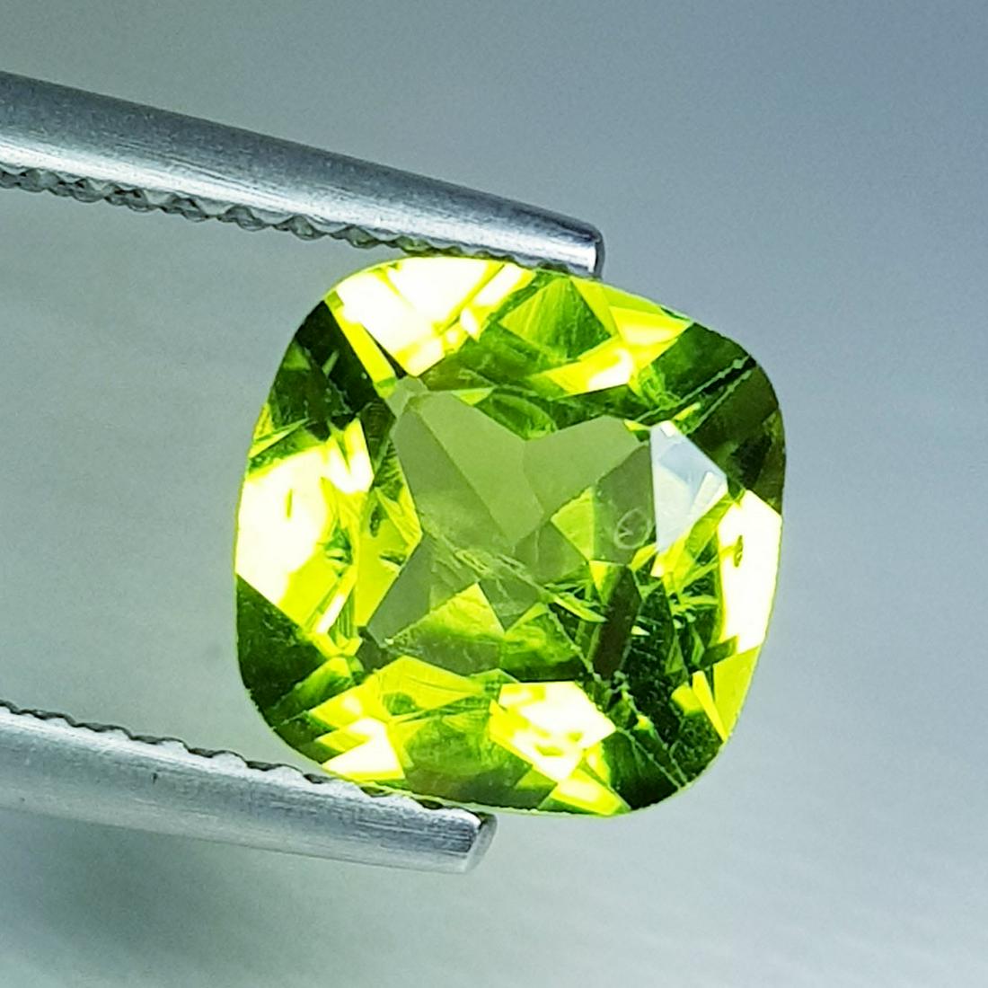 2.14 ct Natural Peridot Cushion Cut: No Reserve! Title: 2.14 ct Natural Peridot Cushion Cut Color/Clarity: VVS Loosegemstone Carat Weights: 2.14 Size/Dimensions: 8.00 x 8.00 x 4.50 Cushion - Pakistan Shipping: Worldwide: Flat-rate of $10