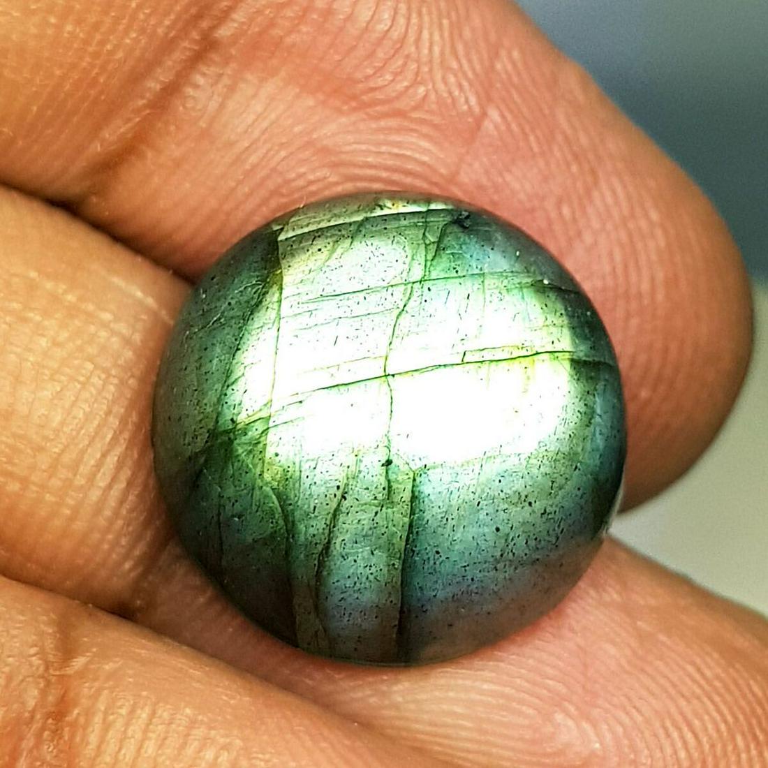 12.30 ct Natural Labradorite: No Reserve! Title: 12.30 ct Natural Labradorite Color/Clarity: Opaque Gemstones Carat Weights: 12.3 Size/Dimensions: 15.35 x 6.55 Round - USA Shipping: Worldwide: Flat-rate of $10.00 to anywhere in th
