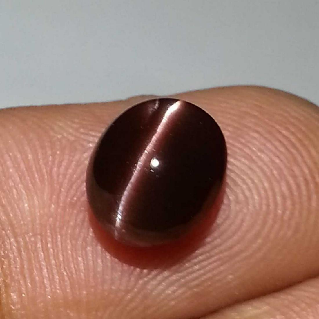 2.92 ct Natural Scapolite Cat' Eye: No Reserve! Title: 2.92 ct Natural Scapolite Cat' Eye Color/Clarity: Opaque Loosegemstone Carat Weights: 2.92 Size/Dimensions: 9.00 x 7.80 x 5.90 Oval - Africa Shipping: Worldwide: Flat-rate of $10.00