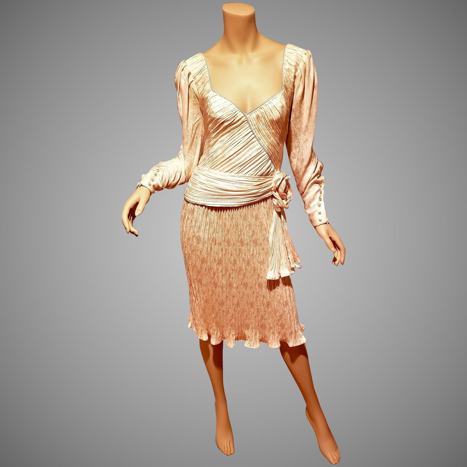 Haute Couture Numbered Emanuel Ungaro Silk Plise': Amazing Haute Couture Numbered Emanuel Ungaro silk Plise' dress Made in France In very Good Vintage condition. Also dated 1985 Bust-32" Waist-25" Please note that the Reserve Price is equal to the Sta