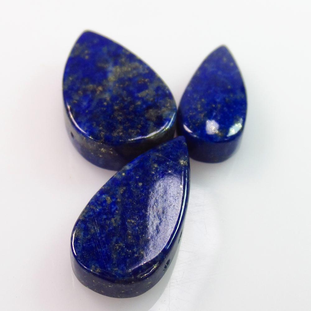23.31 Ct Genuine 3 Drilled Blue Lapis Lazuli Pear Cab: No Reserve! Title: 23.31 Ct Genuine 3 Drilled Blue Lapis Lazuli Pear Cab Stone Clarity: Opaque Loose Gemstone: Natural Lapis Lazuli Carat Weights: 23.31 Size/Dimensions: 18.6x7.8 to 19.7x11.8 mm / 3 P