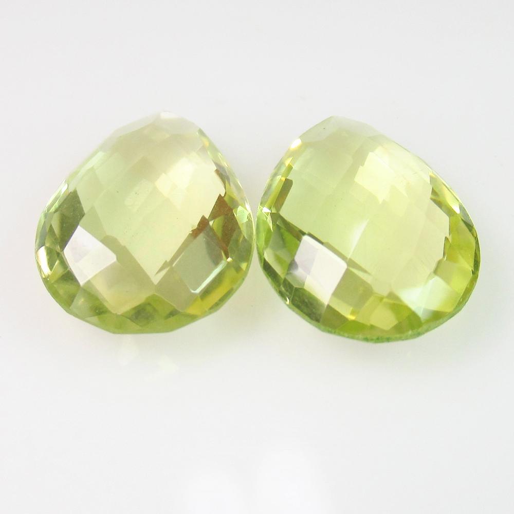 7.86 Ct Genuine Lemon Quartz Pear Checkerboard Pair: No Reserve! Title: 7.86 Ct Genuine Lemon Quartz Pear Checkerboard Pair Stone Clarity: VVS Loose Gemstone: Natuarl Lemon Quartz Carat Weights: 7.86 Size/Dimensions: 14.00 x 10.20 x 4.70 mm / 2 PC's Top