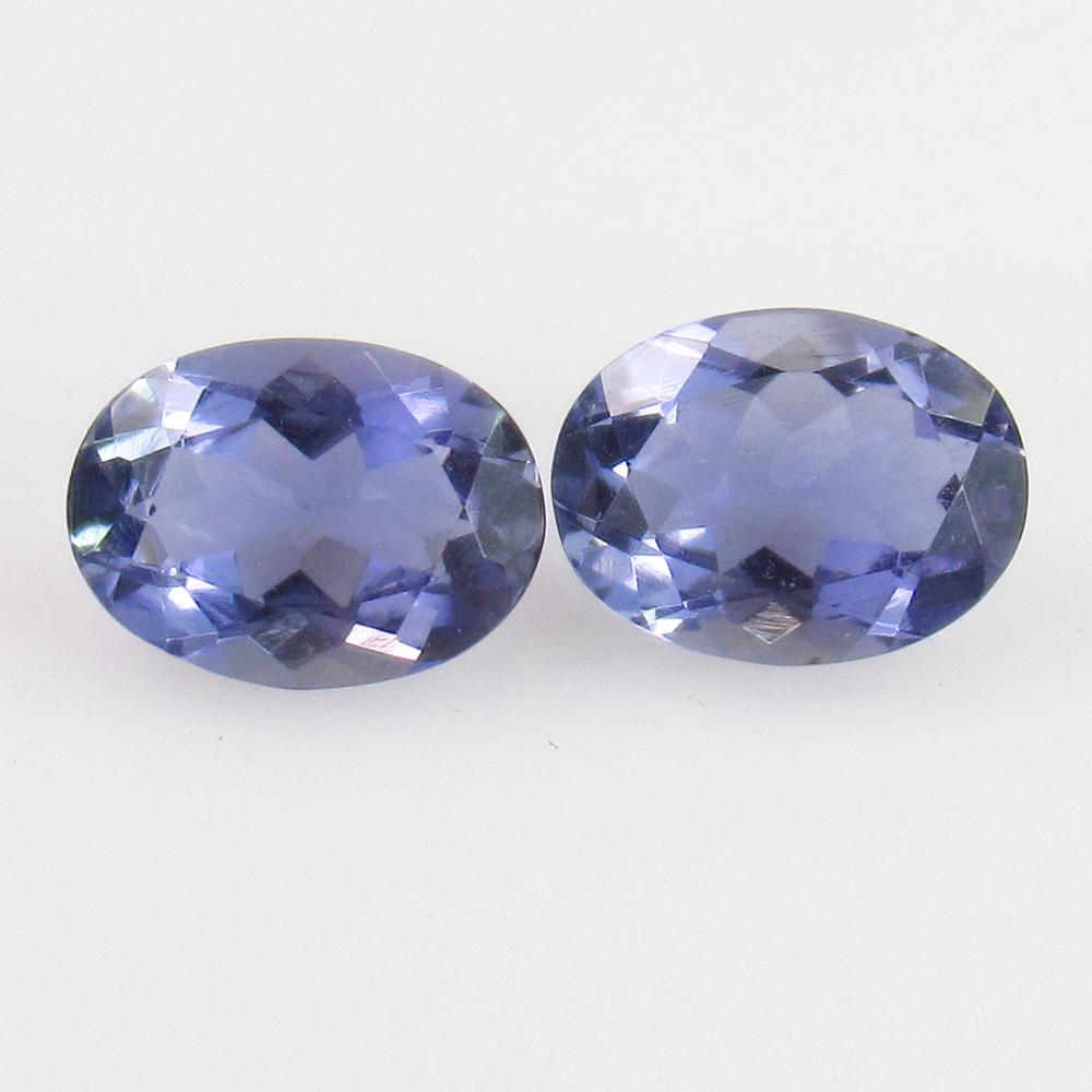 2.12 Ct Genuine Iolite 8X6 mm Oval Pair: No Reserve! Title: 2.12 Ct Genuine Iolite 8X6 mm Oval Pair Stone Clarity: VVS Loose Gemstone: Natural Iolite Carat Weights: 2.12 Size/Dimensions: 8.00 x 6.00 x 4.00 mm / 2 PC's Very Good Luster / Exce