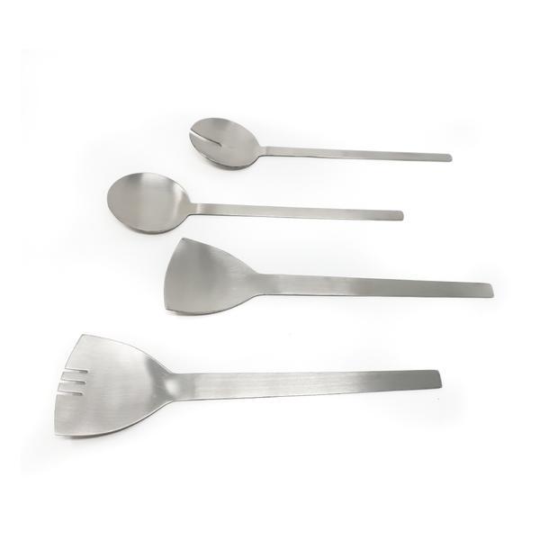 1980s Deco Stainless Serving Utensils - Set of Four: A handsome set of four 1980s Art Deco-inspired serving utensils. All have thin and elegant stainless steel handles, two with round heads and two have triangular heads. In excellent vintage condition w