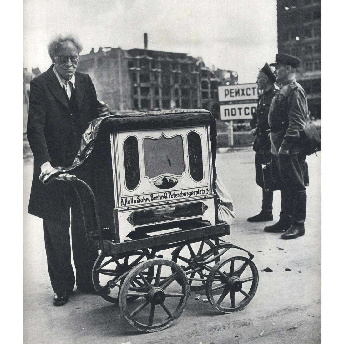 ROBERT CAPA - Berlin, 1945: Artist: ROBERT CAPA Print Title: Berlin, 1945 Medium: Sheet-fed Gravure Printing Date: 1960's Printed in Italy Image Size approx: 9.75 x 9.5 inches Robert Capa (1913-1954) was a Hungarian war photogra