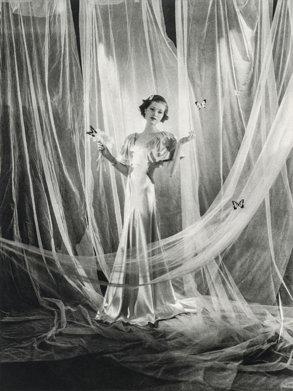 CECIL BEATON - Mary Taylor Modeling Evening Dress: Artist: Cecil Beaton Title: Mary Taylor Modeling Evening Dress, 1930s Medium: Photo Litho, 1981, USA Dimensions: 6.3x8.4" Heat Wax Mounted on 8.5x11" Conservation Board Cecil Beaton was an English fas