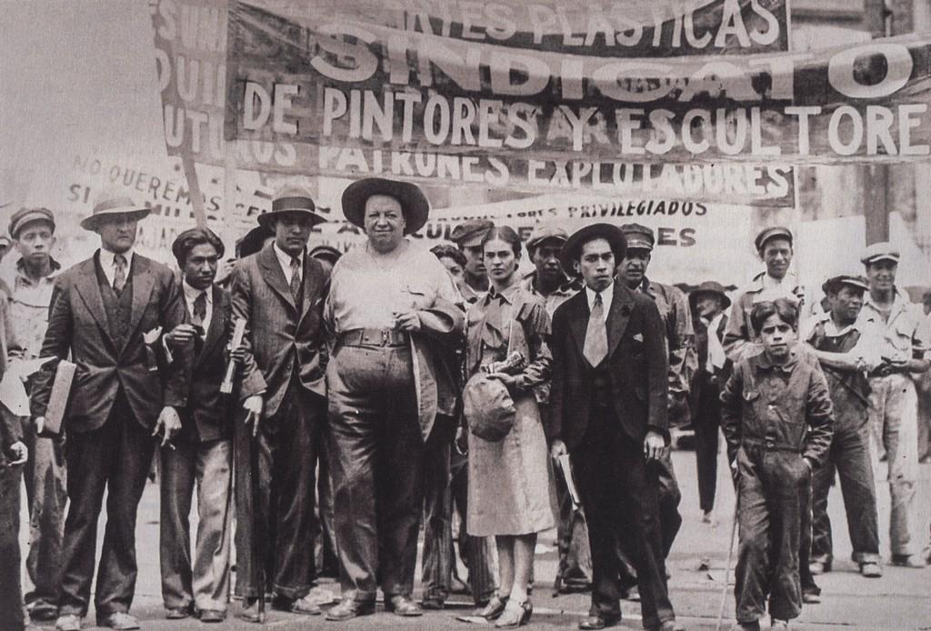 TINA MODOTTI - Diego Rivera, Frida Kahlo, Artist Union: Artist: Tina Modotti Title: Diego Rivera, Frida Kahlo, Artist's Union, May Day 1929 Medium: Photo Litho, 1993, Italy Dimensions: 6.45x4.4" Heat Wax Mounted on 8.5x11" Conservation Board Tina Modotti (