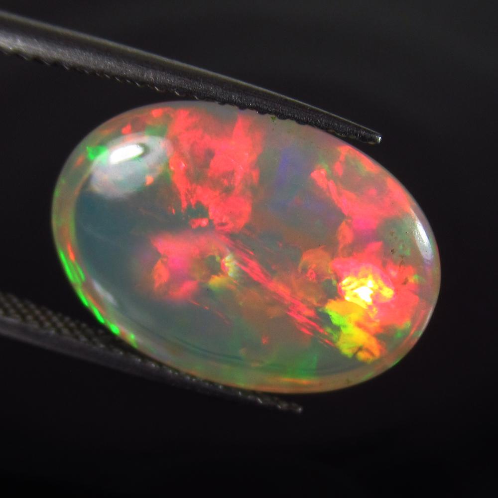 6.38 Ct Genuine Ethiopian Multi-Color Fire Opal Oval (1 of 2)