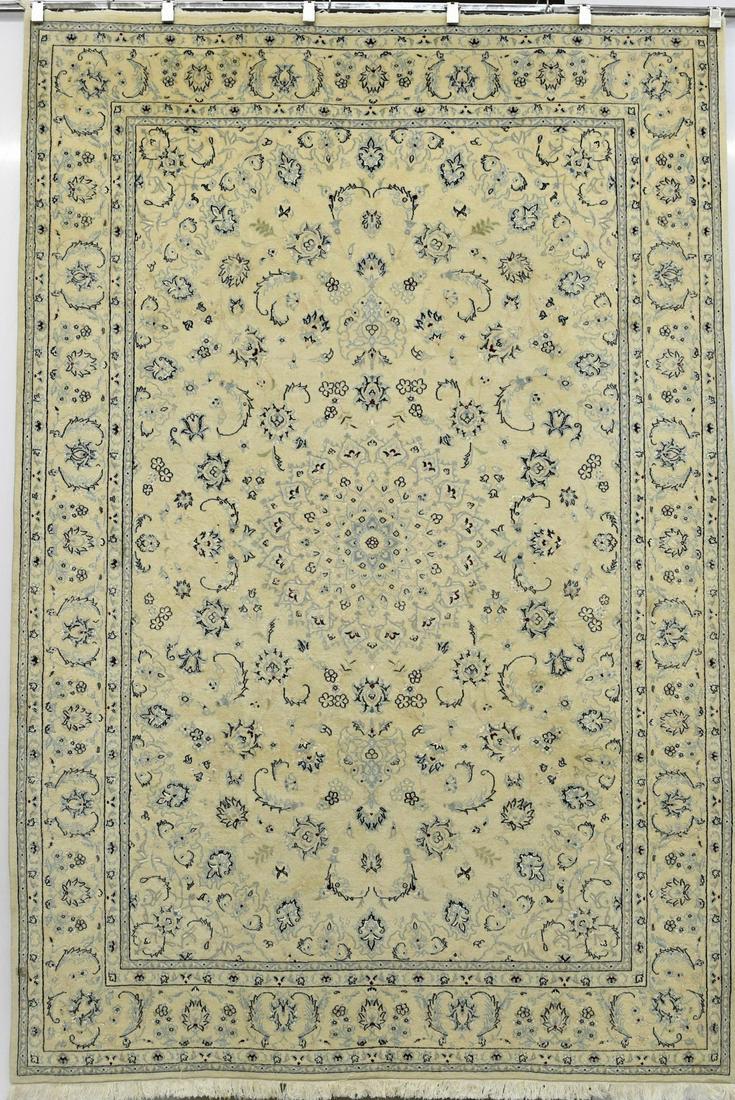 Persian Naein Rug: Title: Persian Naein Rug Date/Period: 2000 Materials: Silk / Wool Dimensions: 9.8x6.7 Additional Information: Persian Naein Rug Medallion Beige, Dark Blue Reserve: $1,000.00 Shipping: Domestic: Flat-
