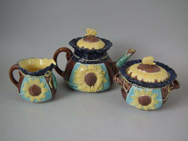 Majolica Sunflower Pattern Part Tea Set: Title: Majolica Sunflower Pattern Part Tea Set Description: Majolica Sunflower Pattern Part Tea Set Description Majolica tea set which features a teapot, a lidded bowl and a milk jug. Sunflower motifs