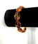 Luxury bracelet with carved Baltic amber