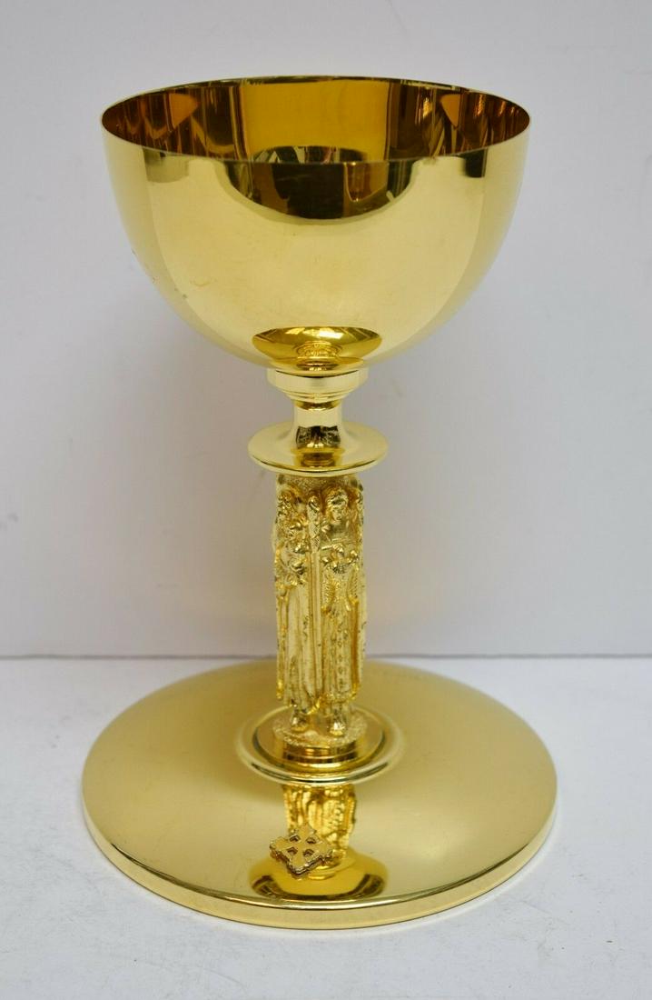 Nice Older Gold Plated Church Chalice + 7 5/8" tall +: This is a nice lightly used Chalice as shown It stands 7 5/8" tall, 4 1/4" cup diameter, 5 3/8" base diameter Gold plated Memorial on base Has some signs of use inside cup Reserve: $166.50 Shipping: D