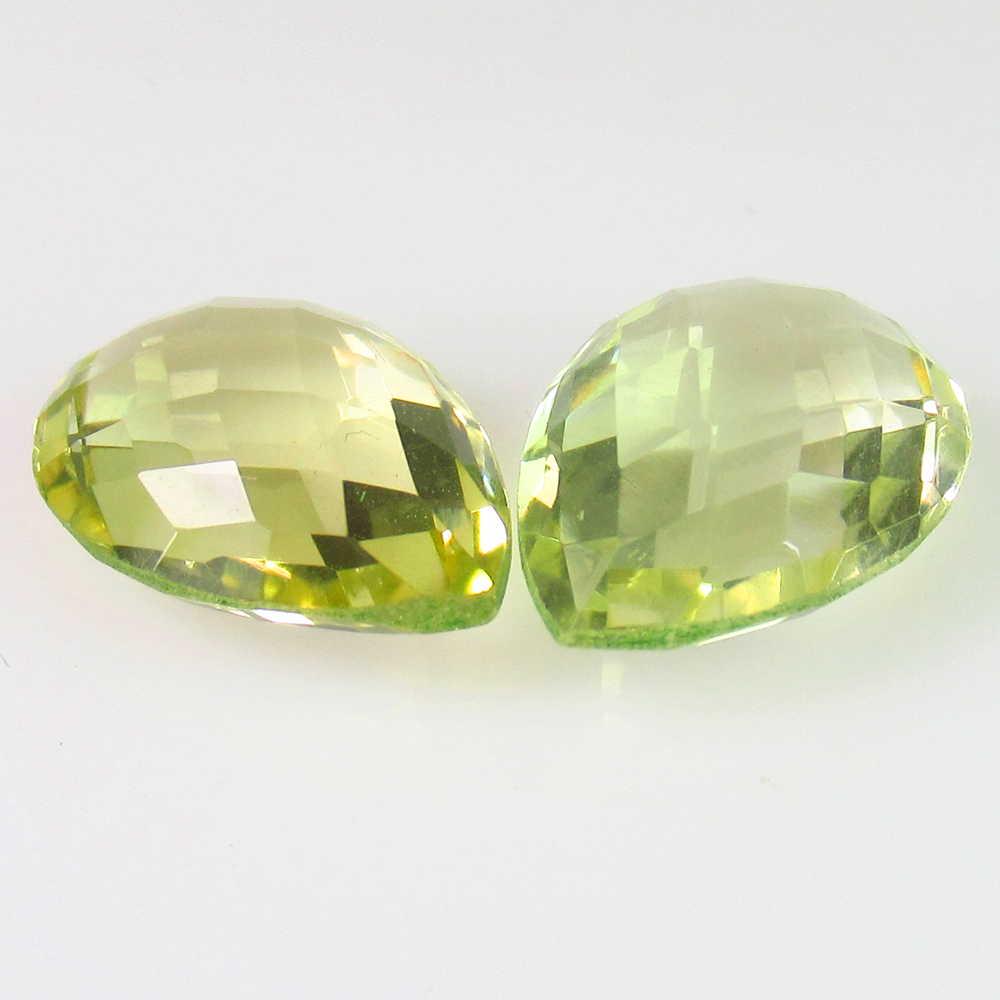 9.45 Ct Genuine Lemon Quartz Pear Checkerboard Cut Pair: No Reserve! Title: 9.45 Ct Genuine Lemon Quartz Pear Checkerboard Cut Pair Stone Clarity: VVS Gemstones: Natuarl Lemon Quartz Carat Weights: 9.45 Size/Dimensions: 14.10 x 11.50 x 5.50 mm / 2 PC's Addi