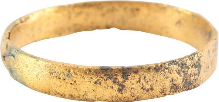 VIKING WOMAN’S WEDDING RING SZ 7 ¾: Rare variation with the flat faced band expanding in width from 3.0 to 3.3 mm and the top in three facets with the rest of the band round. Light texture from burial. . Vikings exchanged rings on the p
