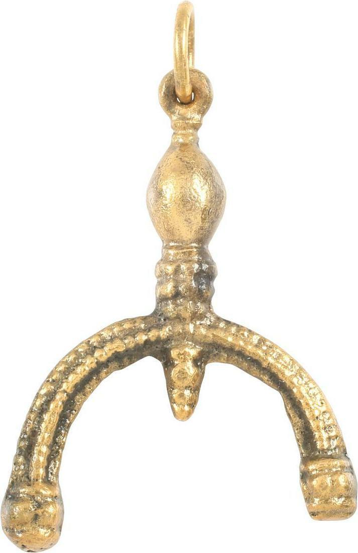 VIKING NAVIGATOR’S PENDANT C.900-1050 AD: Gilt bronze. As expert navigators, the constellations signified mystery and power to Vikings. Lunar pendants were worn as pectorals as well as suspended from belts, other clothing and horse harnesses.