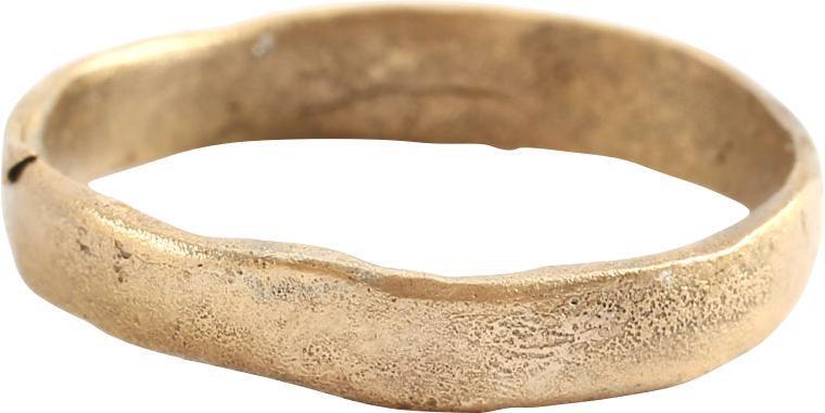 VIKING WOMAN’S WEDDING RING SIZE 7 ½. 9th- 11th century: Gilt bronze, size 7 1/2. Broad 3.9mm width band with slightly rounded face. Surface slightly textured overall from burial. Vikings exchanged rings on the pommel of the groom’s sword. Professionally 