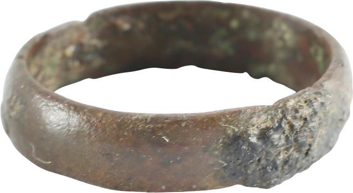 RARE COPPER VIKING RING, 900-1050 AD: No Reserve! Size 4. Medium width band, 4.3mm, with rounded face. Mottled red/brown patina with encrustation from burial. Vikings were expert metallurgists. The use of pure copper is rare and suggests 