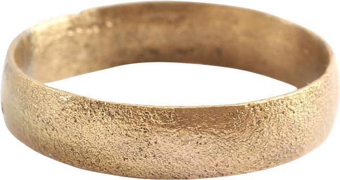 VIKING WOMAN’S WEDDING RING, 9TH-10TH CENTURY AD. SIZE: Gilt bronze, size 6. Broad band, 4.1 mm, with a low rounded face. Professionally refurbished with the 24 karat gold surface restored. Vikings exchanged rings on the pommel of the groom’s sword. Gift