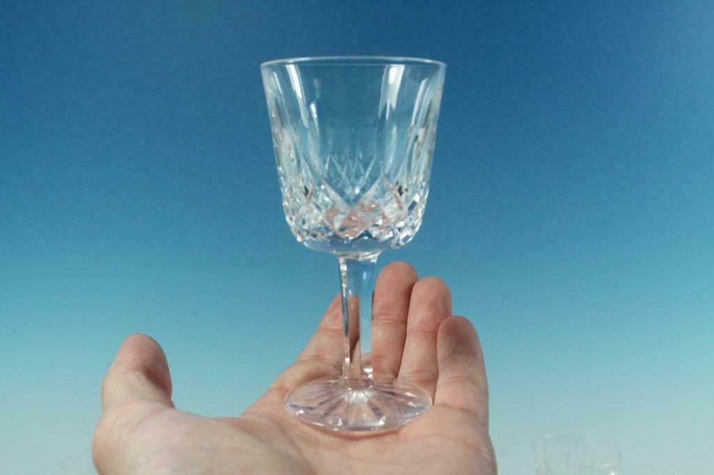SET OF 6 WATERFORD LISMORE 4-1/4" x 2-1/4" 2 OZ. PORT: Title: SET OF 6 WATERFORD LISMORE 4-1/4" x 2-1/4" 2 OZ. PORT WINE GLASSES Descritpion: A set of 6 Waterford Lismore 2 oz. port wine glasses. Standing 4-1/4" inches tall nad 2-1/4" inches wide, these g