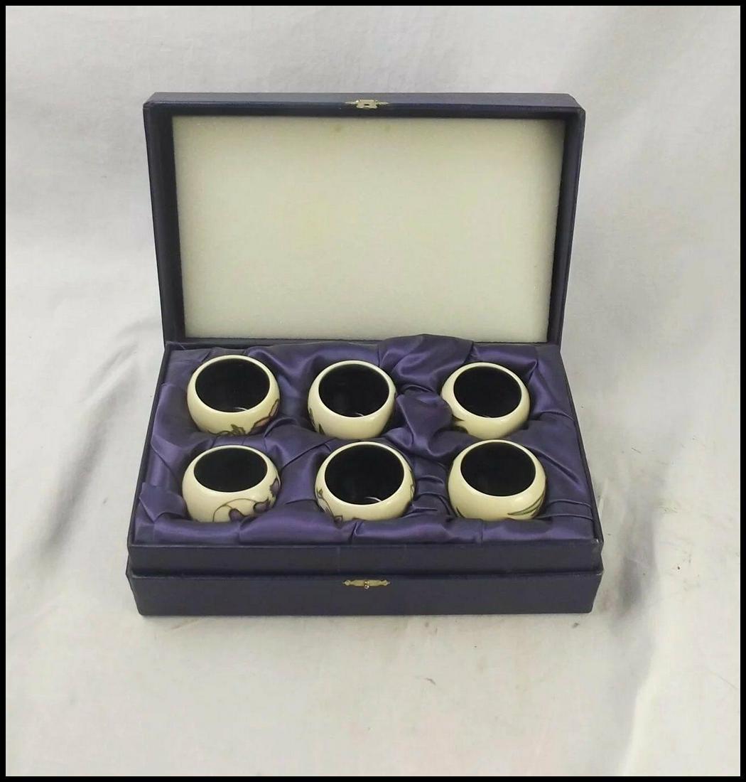 Moorcroft Egg Cups Spring Festival: ~ Moorcroft Egg Cups Spring Festival ~ A set of six Moorcroft egg cups painted with different flowers in the 'Spring Festival' pattern. The bases are impressed with the “MOORCROFT MADE IN ENGLAND”