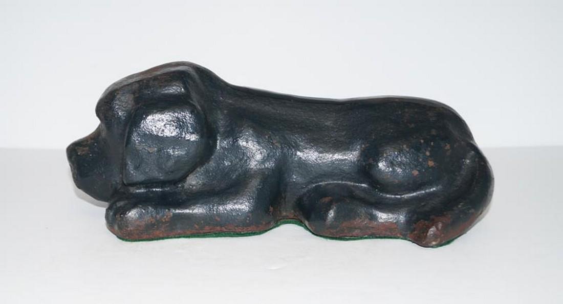 Antique Sleeping Puppy Dog Cast Iron Doorstop: Title: Antique Sleeping Puppy Dog Cast Iron Doorstop Date/Period: Ca. 1920's-30's Dimension: 4 1/4" tall x 11 3/8" long Provenance:Antique full-figure Sleeping Puppy RARE Doorstop. Heavy & substantial