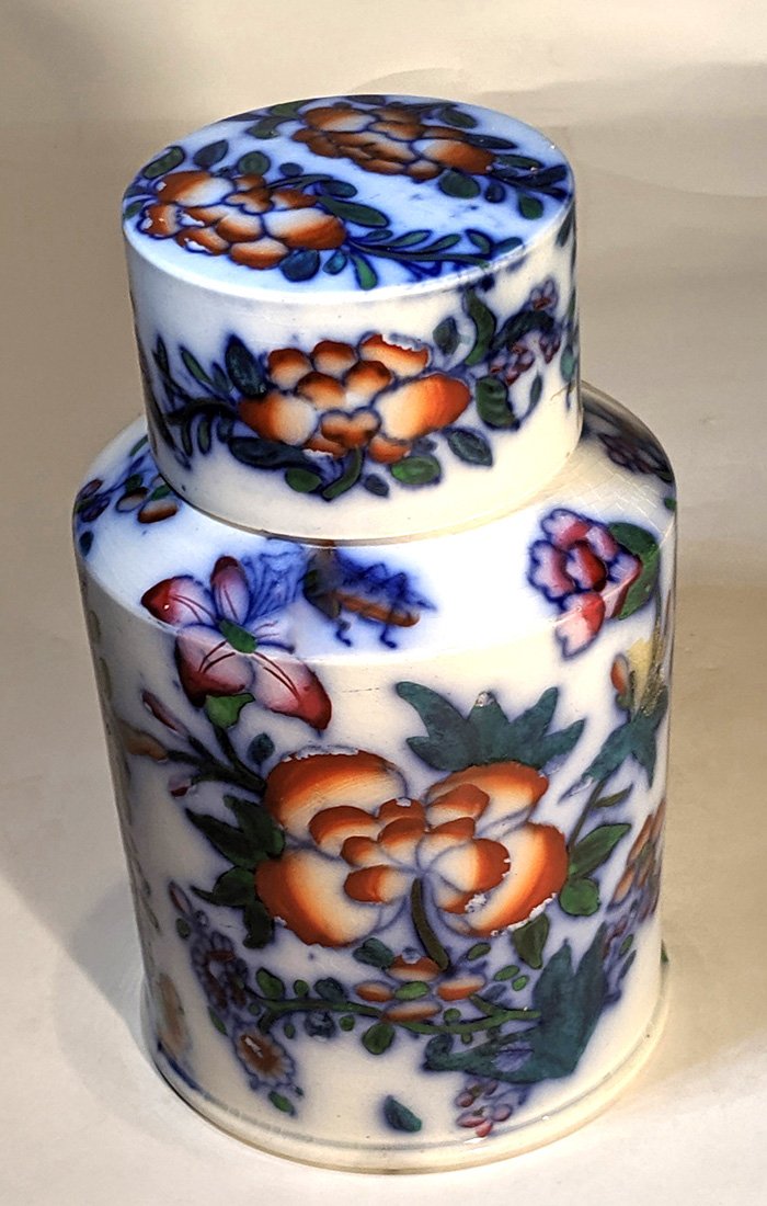 Rare Flow-blue Imari Pattern Canister Tea Caddy: Title: Rare Flow-blue Imari Pattern Canister Tea Caddy Date/Period: 1840 Origin: English Dimension: 6" H Provenance:Rare flow-blue Imari pattern canister tea caddy Shipping: Domestic: Flat-rate of $30