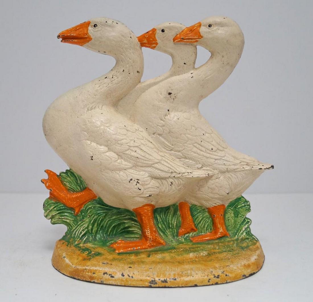 Antique Three Geese Hubley Cast Iron Doorstop: Title: Antique Three Geese Hubley Cast Iron Doorstop Date/Period: Circa 1930’s Dimension: 8 1/8" tall x 7" wide Provenance:Antique Three Geese Cast Iron Doorstop. Showing three (3) geese on a barnya