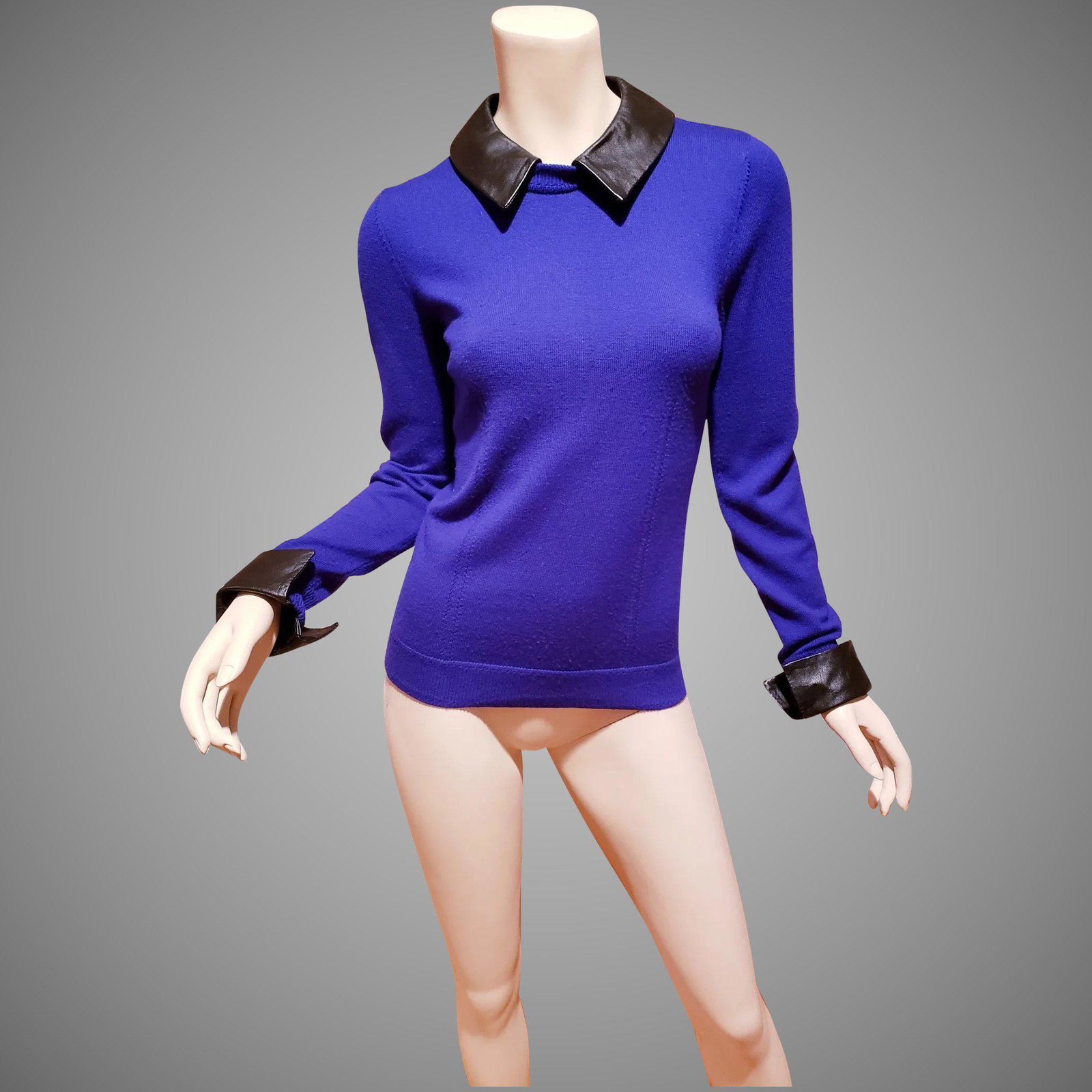 Milly Merino wool Sweater Top with Calf leather trim at: A beautiful knit Merino wool and Calf leather sweater by Milly. In amazing like New vintage condition Size-MThis vintage item is pre-owned and pre-loved. We disclose major defects, but you can expect 