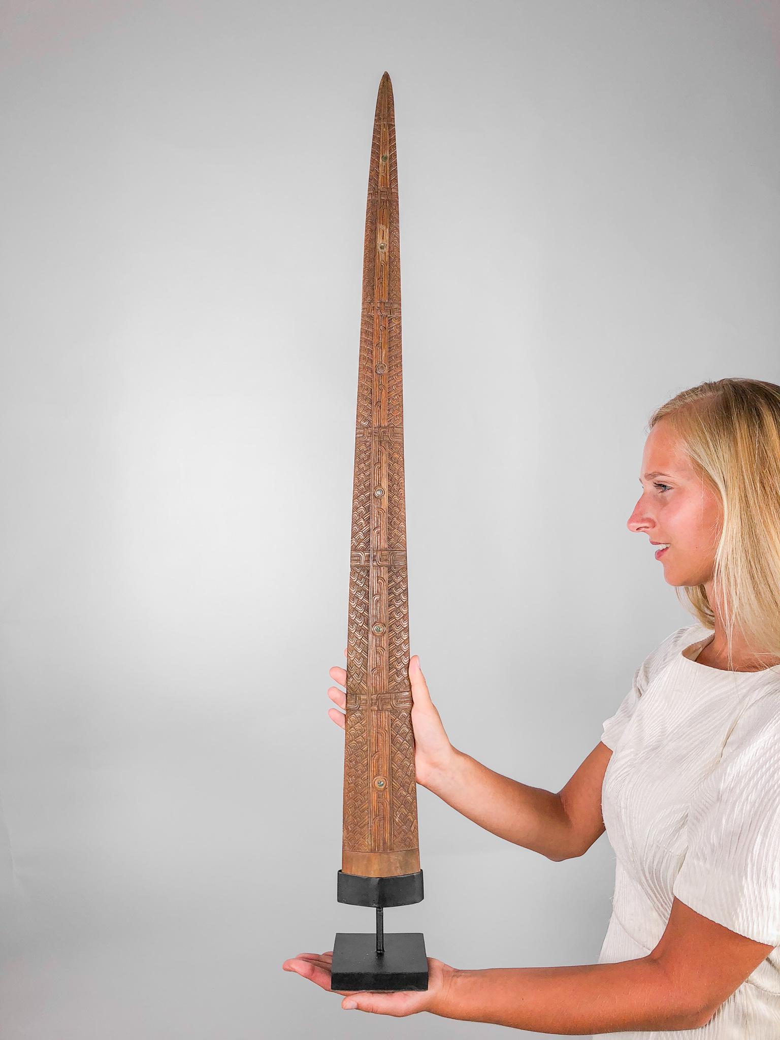 Fine Hand Carved Maori Swordfish Bill - Traditional: Title: Fine Hand Carved Maori Swordfish Bill - Traditional Rauponga Pattern Maker: Unknown Origin: New Zealand Date/Period: 2017 Materials: Bone, Steel Dimensions: Height: 100cm / 39 inches THE STORY 