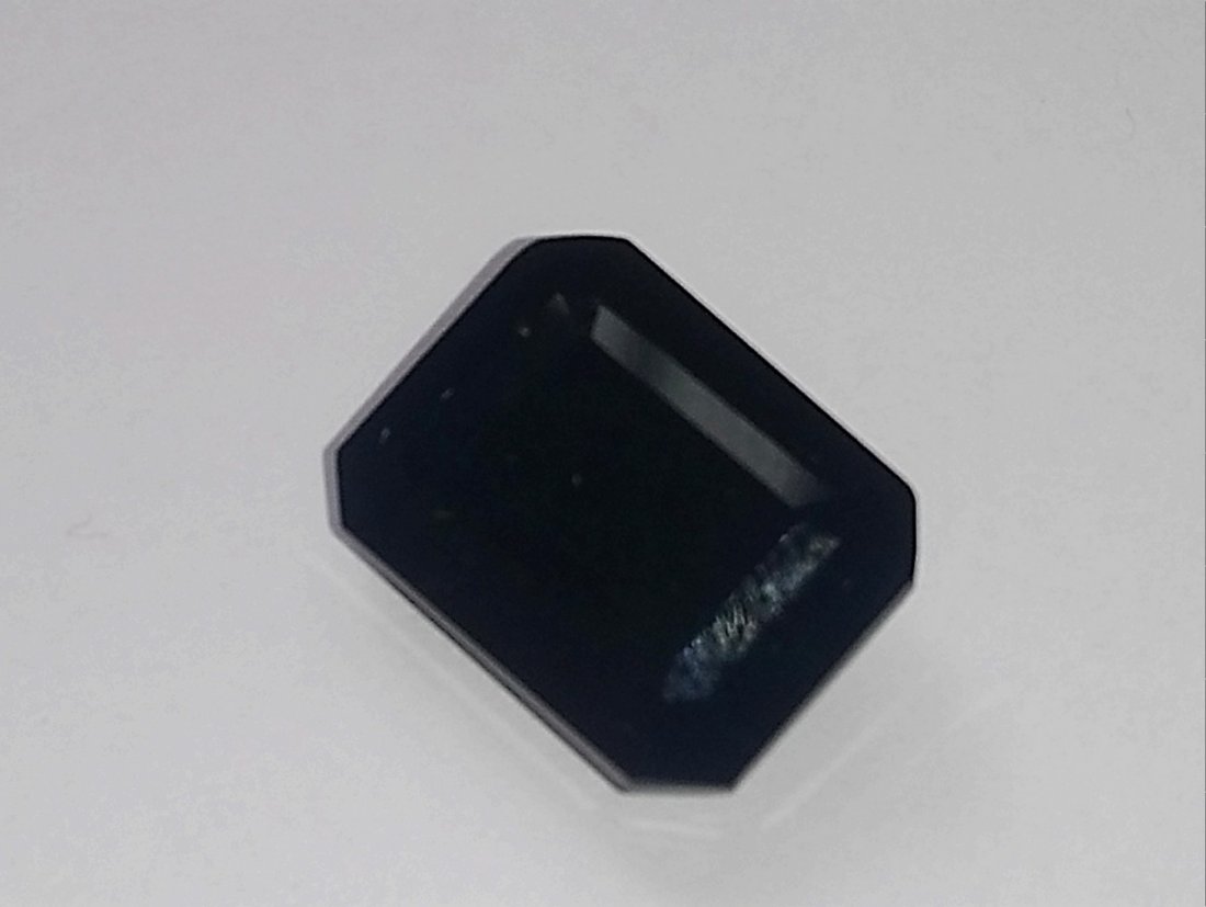 Meteorite: Title: Meteorite Color/Clarity: black/opaque Gemstone Type: natural Carat Weights: apr.6 Size/Dimensions: apr.15x10x5 mm Additional Information: very well cut and polished with very good luster/indoch