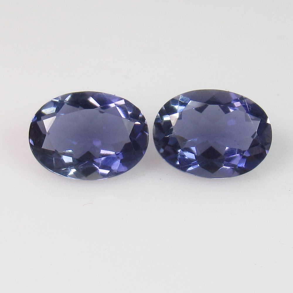 2.03 Ctw Natural Iolite Oval Pair: No Reserve! Title: 2.03 Ctw Natural Iolite Oval Pair Stone Clarity: VVS Gemstones: Iolite Carat Weights: 2.03 Size/Dimensions: 8.20 x 6.10 x 3.80 mm / 2 PC's Additional Information: Very Good Luster /