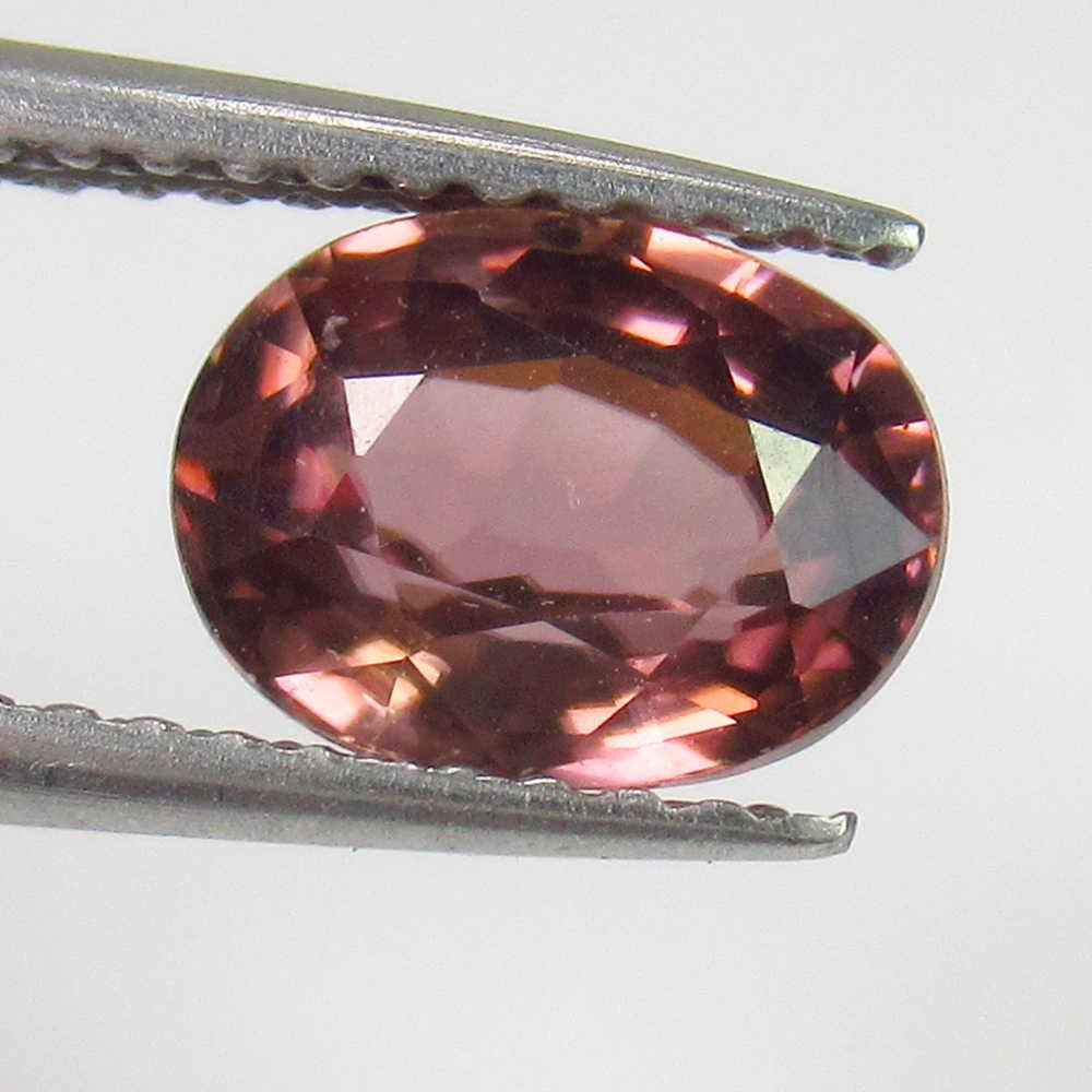 1.92 Ctw Natural Pnk Zircon Oval Cut: No Reserve! Title: 1.92 Ctw Natural Pnk Zircon Oval Cut Stone Clarity: VVS Gemstones: Zircon Carat Weights: 1.84 Size/Dimensions: 7.80 x 5.80 x 4.00 mm Additional Information: Top Luster / Excellent O
