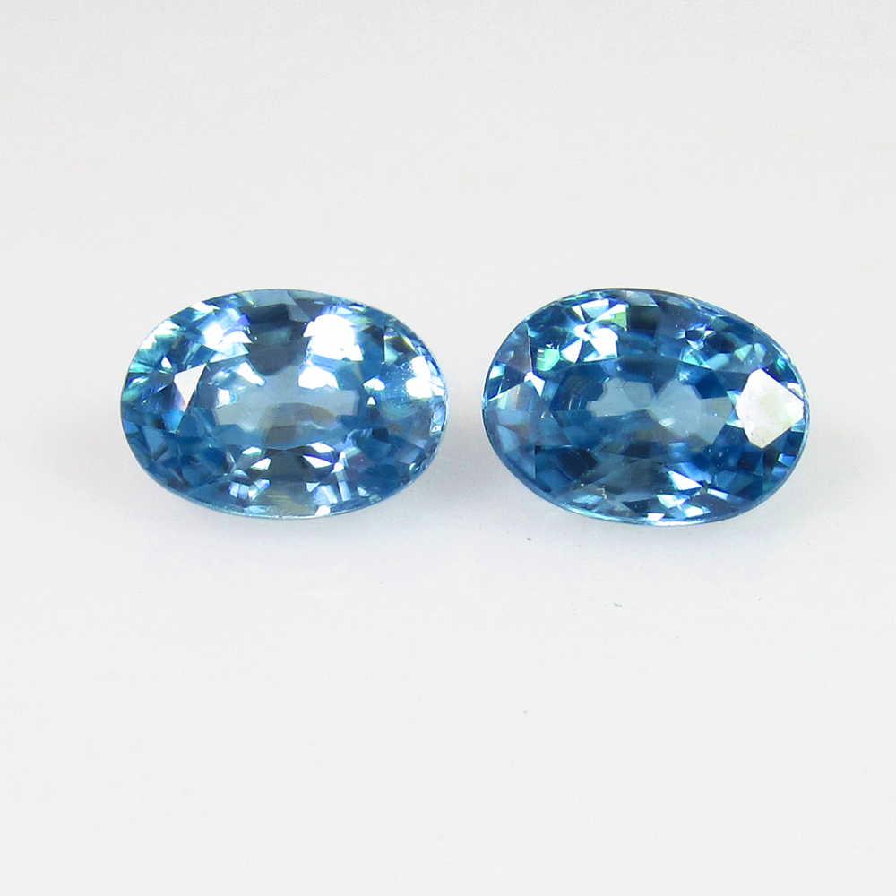 2.81 Ct Genuine Blue Zircon Nice Oval Pair: No Reserve! Title: 2.81 Ct Genuine Blue Zircon Nice Oval Pair Stone Clarity: VVS Gemstones: Natural Zircon Carat Weights: 2.81 Size/Dimensions: 7.10 x 5.10 x 3.70 mm / 2 PC's Additional Information: T