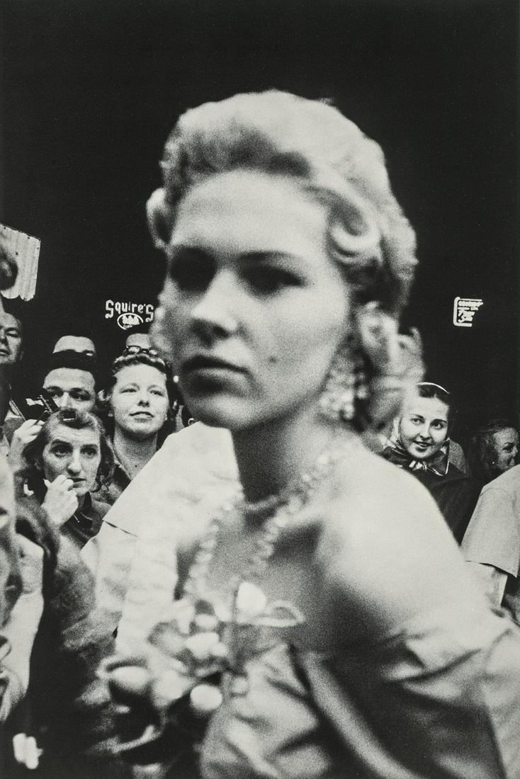ROBERT FRANK - Movie Premiere, Hollywood, 1956: Artist: Robert Frank Title: Movie Premiere, Hollywood, 1956 Medium: Photo Litho, 1995, USA Dimensions: 5.8x8.7" Heat Wax Mounted on 11x14" Conservation Board Robert Frank (1924 - 2019) was an American