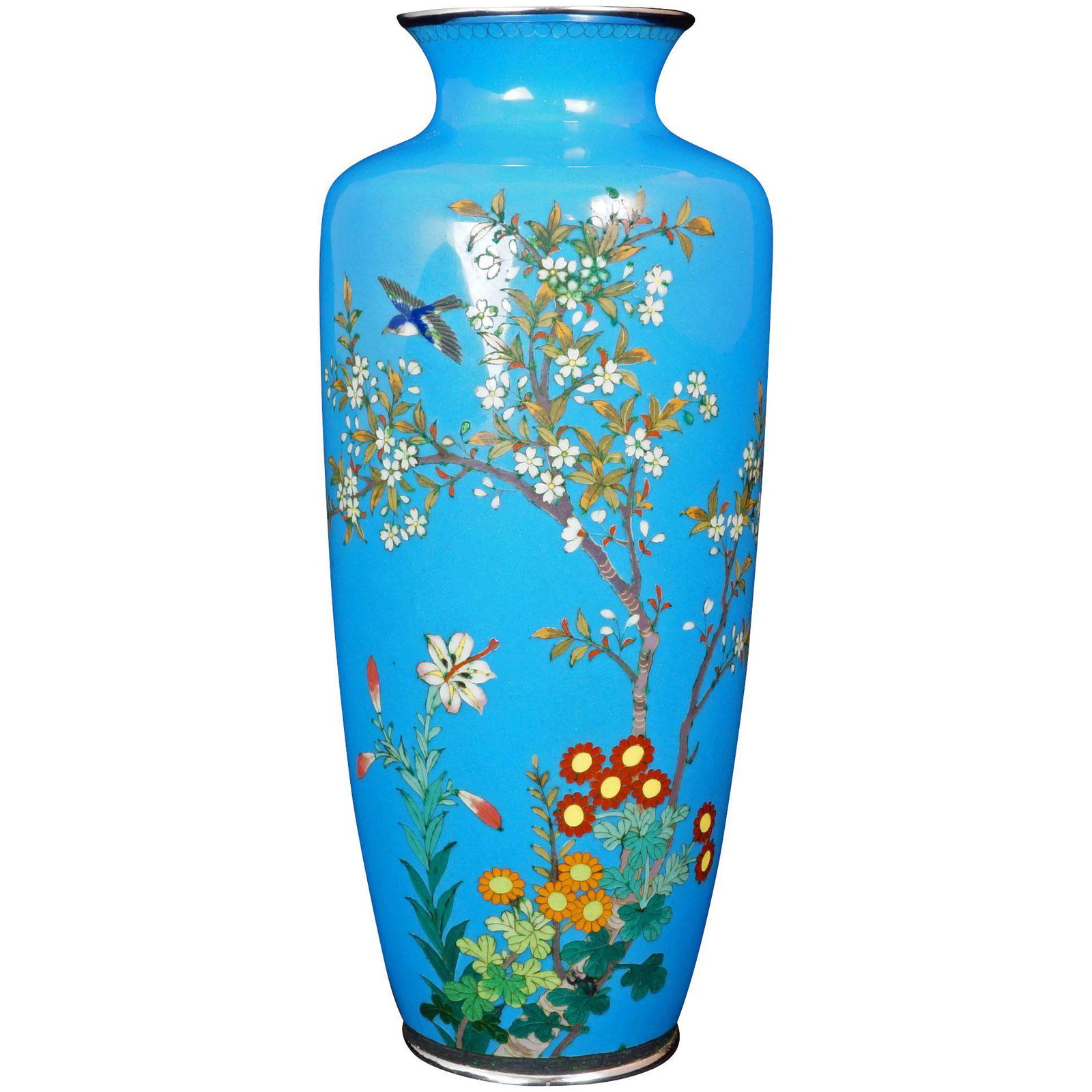 Japanese Meiji Cloisonné Vase with Flowers and Bird: Title: Japanese Meiji Cloisonné Vase with Flowers and Bird Size: 12 x 12 x 12 Additional Information: A nice even deep shade of robin's egg blue with silver rim and foot accents that make this vase s