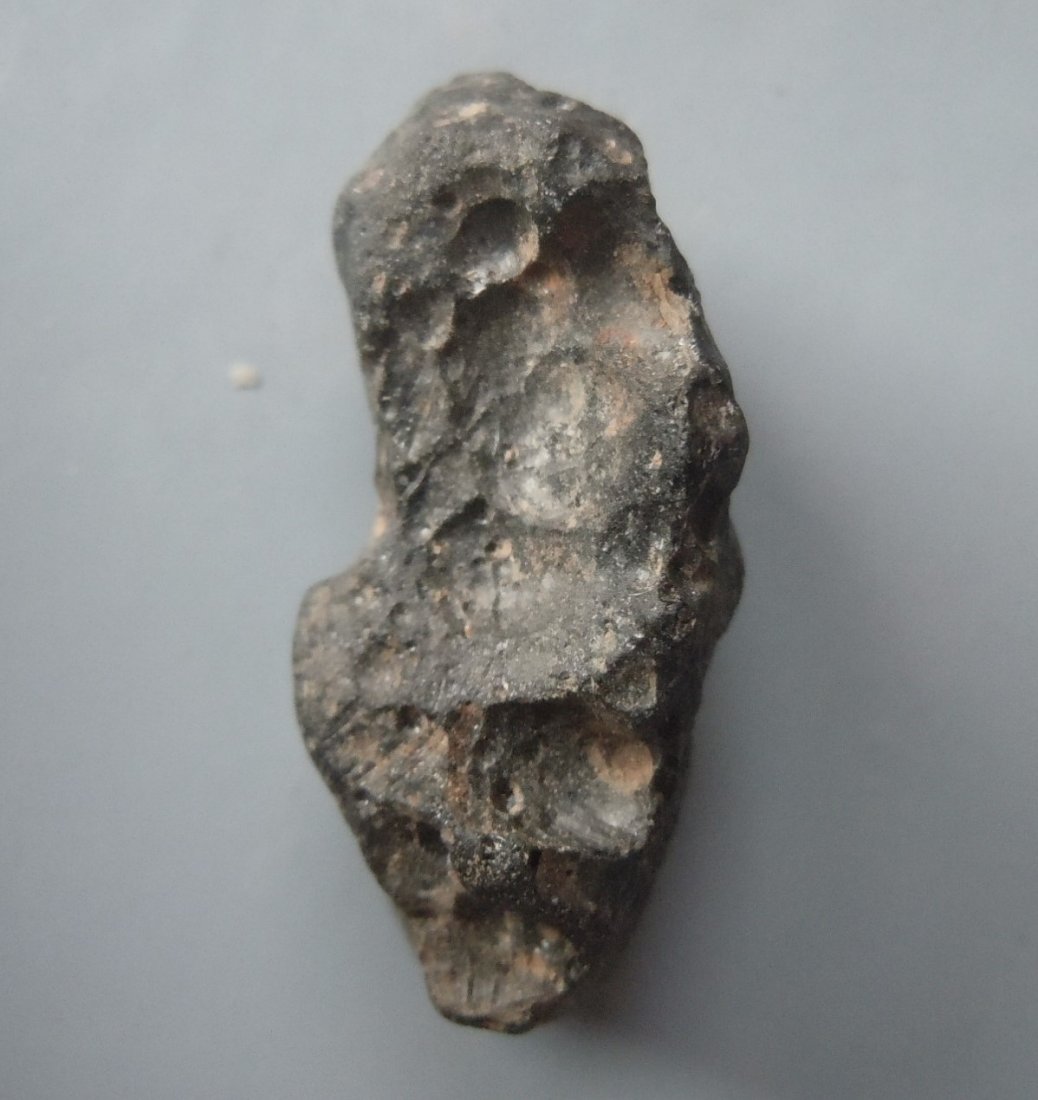 PHILIPPINITE TEKTITE - FROM METEORITE IMPACT: Title: PHILIPPINITE TEKTITE - FROM METEORITE IMPACT Origin: Paracale, Camarines Norte, Luzon, Philippines Size: 2.5x1x1 cm / 5 gram Description: small elongate and ornate rizalite/philippinite tektite