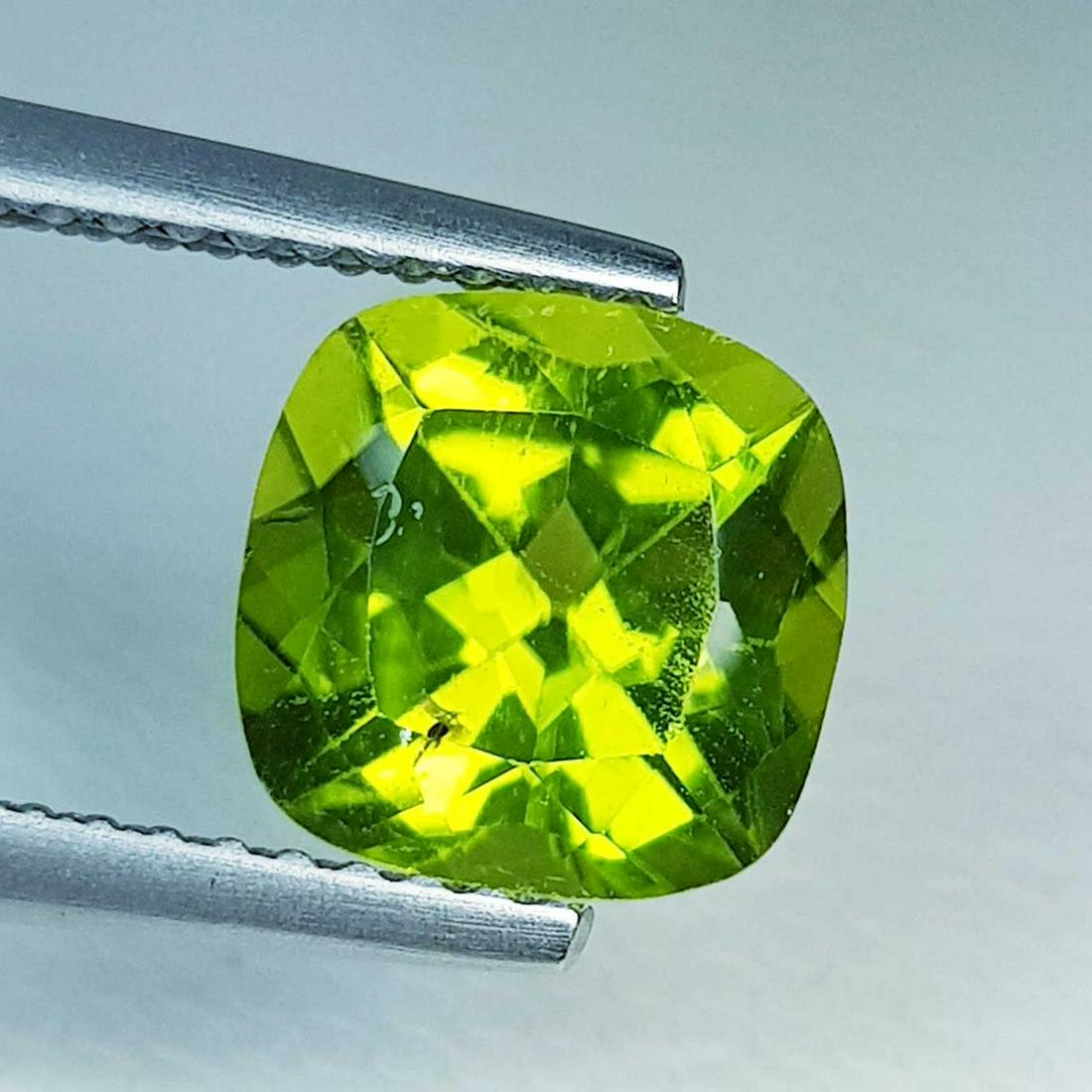2.71 ct Natural Peridot Cushion Cut: No Reserve! Title: 2.71 ct Natural Peridot Cushion Cut Color/Clarity: VVS Gemstones: Loosegemstone Carat Weights: $3 Size/Dimensions: 8.00 x 8.00 x 5.60 Additional Information: Cushion - Pakistan Ship