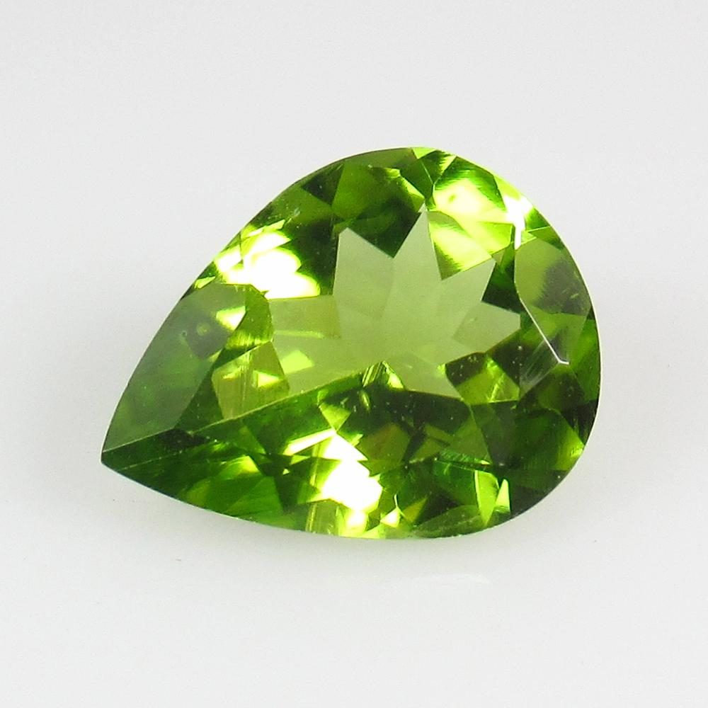 1.89 Ctw Natural Pakistan Peridot Pear Cut: No Reserve! Title: 1.89 Ctw Natural Pakistan Peridot Pear Cut Stone Clarity: VVS Gemstones: Peridot Carat Weights: 1.89 Size/Dimensions: 9.10 x 7.20 x 4.70 mm Additional Information: Top Class Luster 
