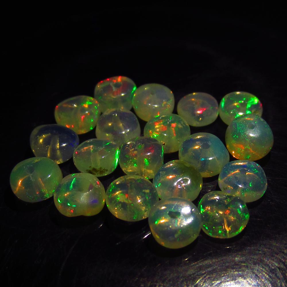 5.40 Ct Genuine 19 Drilled Round Multi-Color Fire Opal: No Reserve! Title: 5.40 Ct Genuine 19 Drilled Round Multi-Color Fire Opal Beads Stone Clarity: Transparent Gemstones: Natural Opal Beads Carat Weights: 5.40 Size/Dimensions: 4.50 to 4.80 mm / 19 PC's 