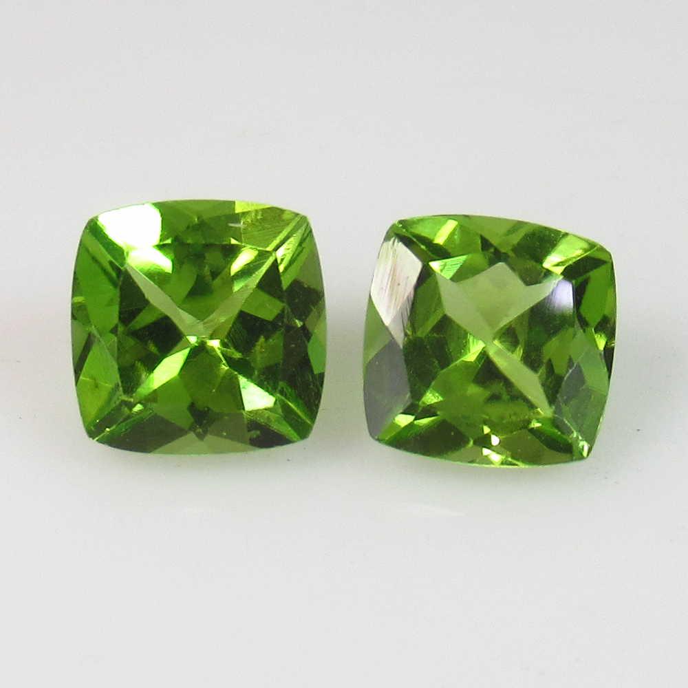 3.38 Ct Genuine Pakistan Peridot Cushion Pair: No Reserve! Title: 3.38 Ct Genuine Pakistan Peridot Cushion Pair Stone Clarity: VVS Gemstones: Natural Peridot Carat Weights: 3.38 Size/Dimensions: 6.90 x 7.00 x 4.80 mm / 2 PC's Additional Informatio