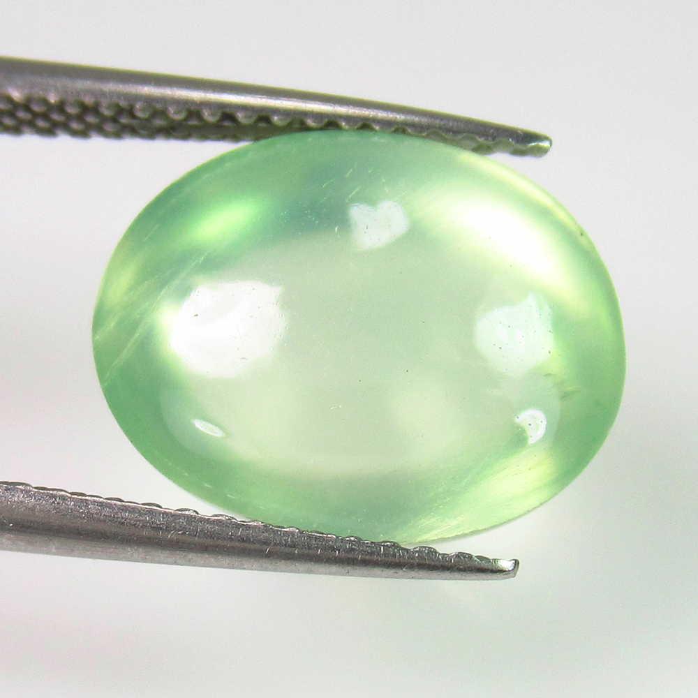 8.81 Ct Genuine Green Prehnite Oval Cab: No Reserve! Title: 8.81 Ct Genuine Green Prehnite Oval Cab Stone Clarity: Transparent Gemstones: Natural Prehnite Carat Weights: 8.81 Size/Dimensions: 12.70 x 10.40 x 8.90 mm Additional Information: T