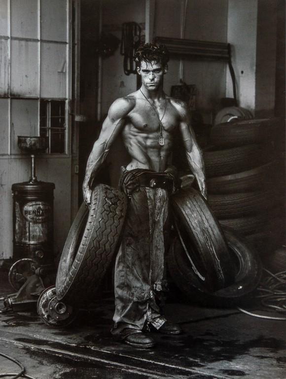 HERB RITTS - Fred, Tires, Hollywood, 1984: Artist: Herb Ritts Title: Fred, Tires, Hollywood, 1984 Medium: Photo Litho, 1985, Japan Dimensions: 9.2x12.1" Heat Wax Mounted on 12x16" Conservation Board Herb Ritts (1952-2002) was an American fashi
