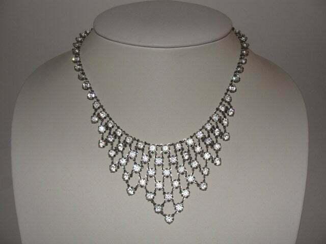 Sterling Silver and French Paste Bib Necklace Cut Glass: Classic and period........ Circa 1940's to 1950's....... Sterling silver bib necklace......... Gorgeous faceted cut glass....... Necklace measures 13" with a 3" extender for a total of 16" long.... Ea