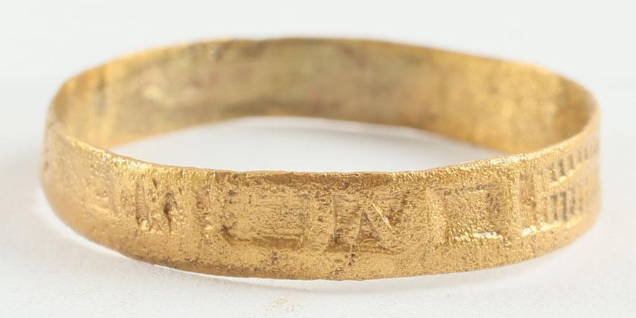 FINE VIKING MAN’S WEDDING RING, 10TH-11TH CENTURY AD: ¾. Broad band, 4.1mm, decorate half its circumference with a double stipple band. The balance with a series of impressed designs including squares, saltires and others, probably symmetrically arrange
