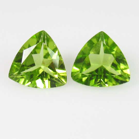 3.14 Ct Genuine Pakistan Peridot Trillion Pair: Title: 3.14 Ct Genuine Pakistan Peridot Trillion Pair Stone Clarity: VVS Gemstones: Natural Peridot Carat Weights: 3.14 Size/Dimensions: 8.00 x 8.20 x 4.50 mm / 2 PC's Additional Information: Top Clas
